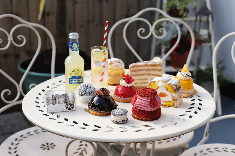 Cakes and drinks on a table